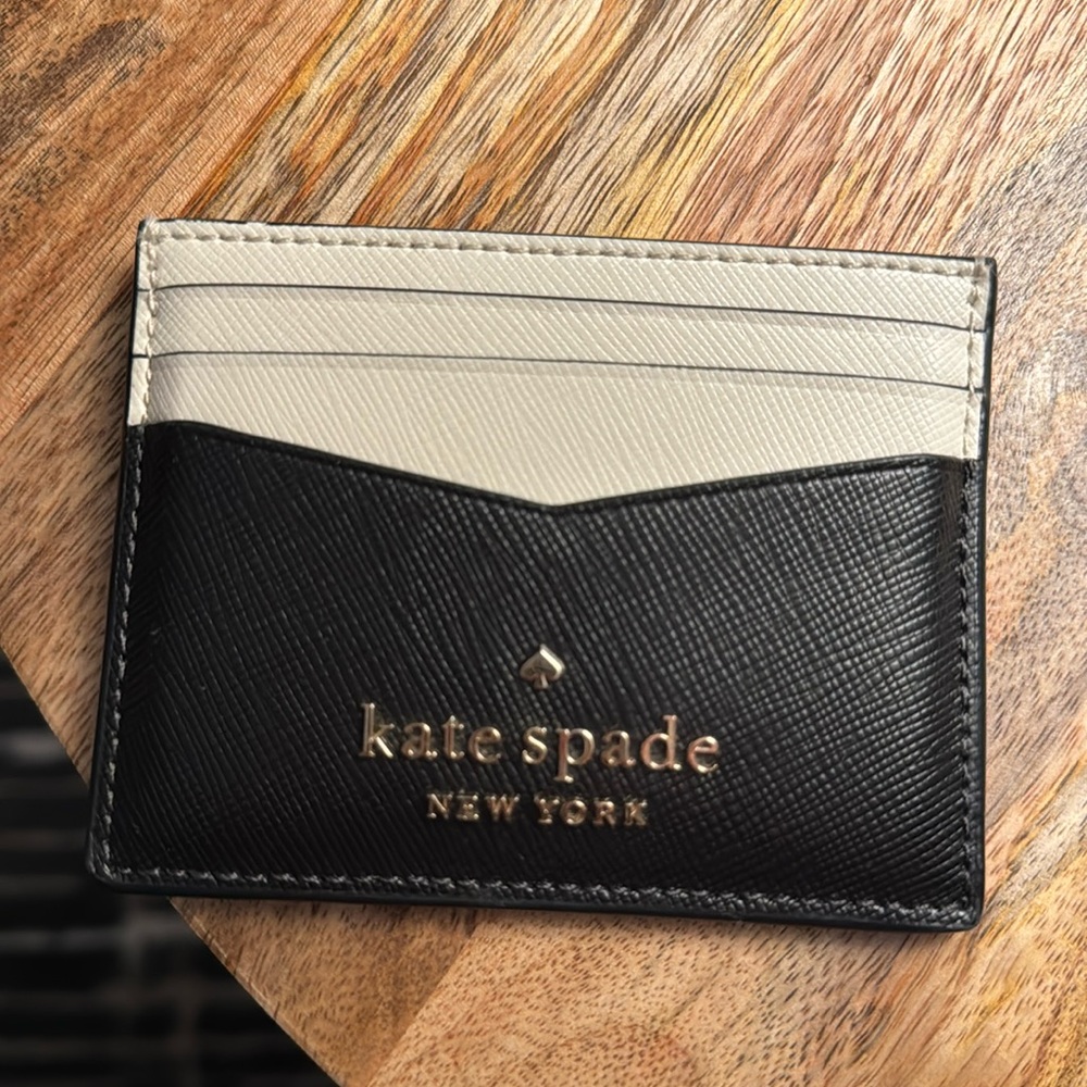 This very cute small easy to use mini wallet from Kate Spade
